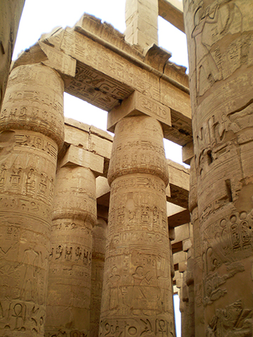 Hieroglyphs covering the columns and cross supports in Karnak.